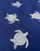 Sandbar_Swimwear_embroidered_turtle_fabric_father_son