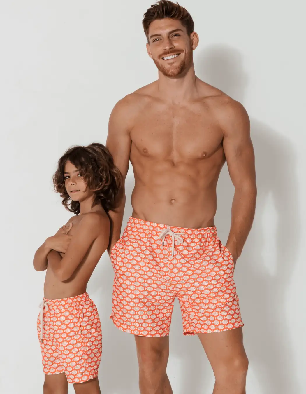 father and son swim shorts coral fish