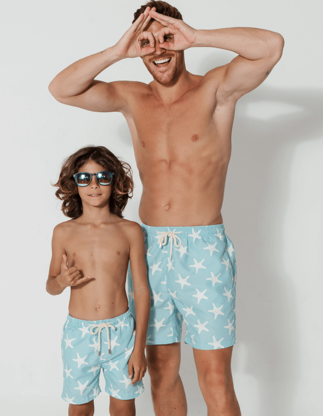 father and son swim shorts blue starfish